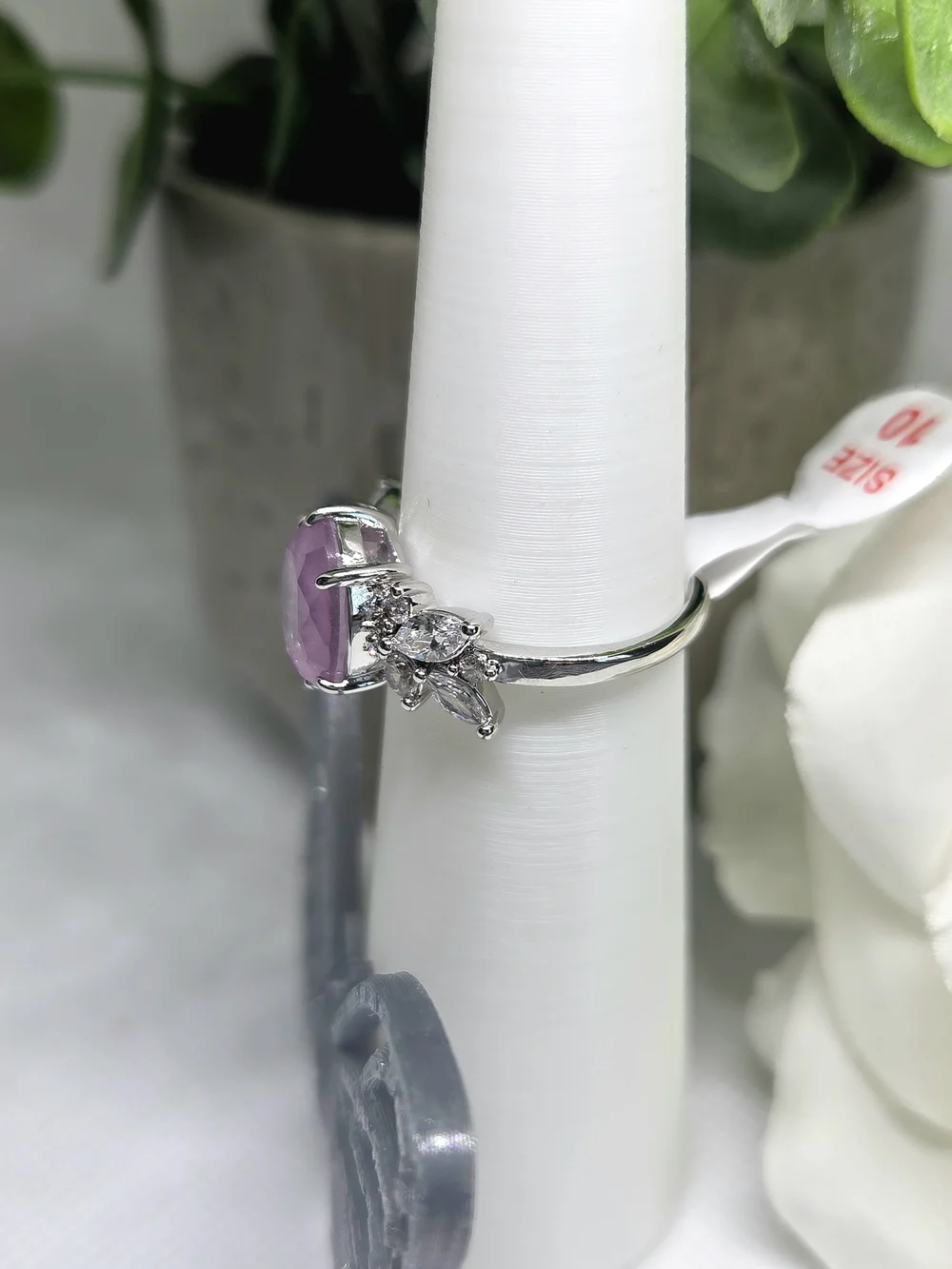 BP Pink Oval CZ Ring with Clear Accent Stones